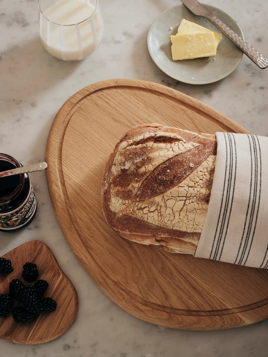Broste large oval oak chopping board with groove