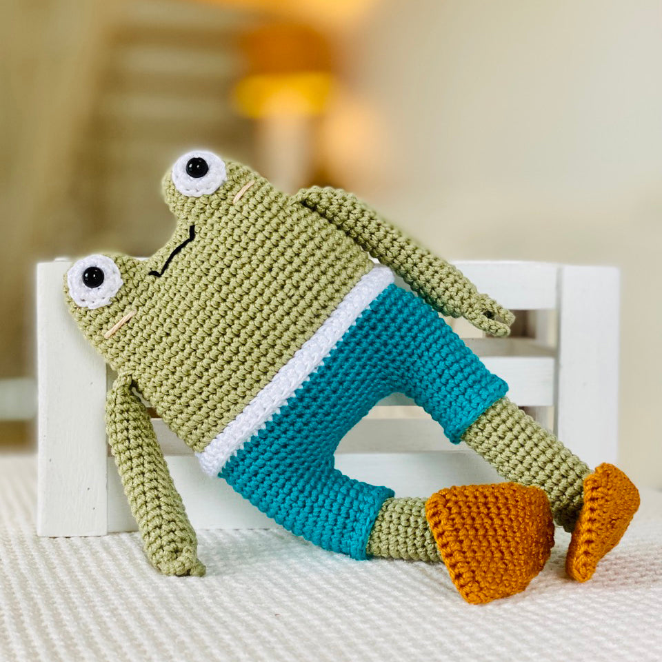 Fairtrade knit Freddo frog toy