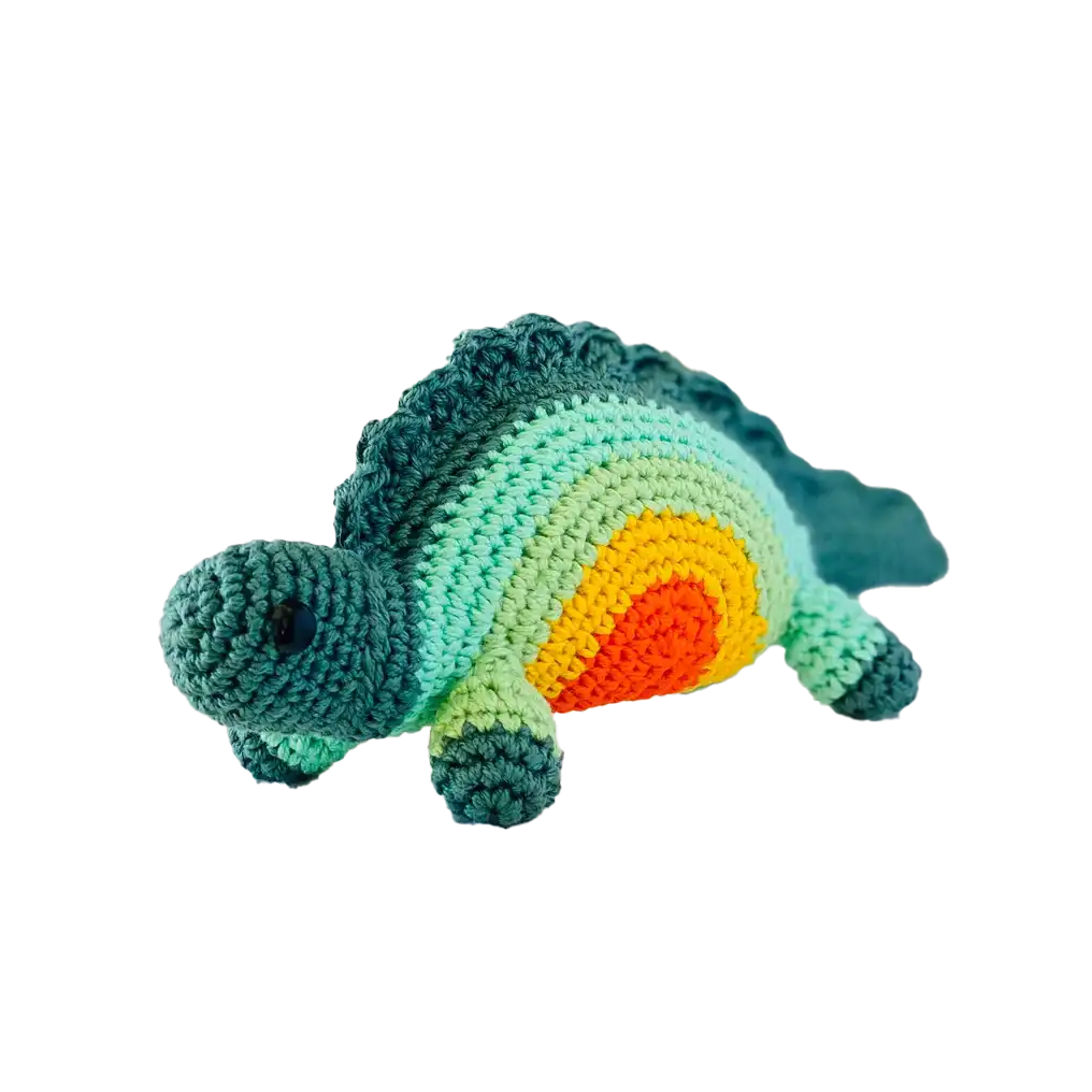 Fairtrade knit rainbow stegosaurus toy
