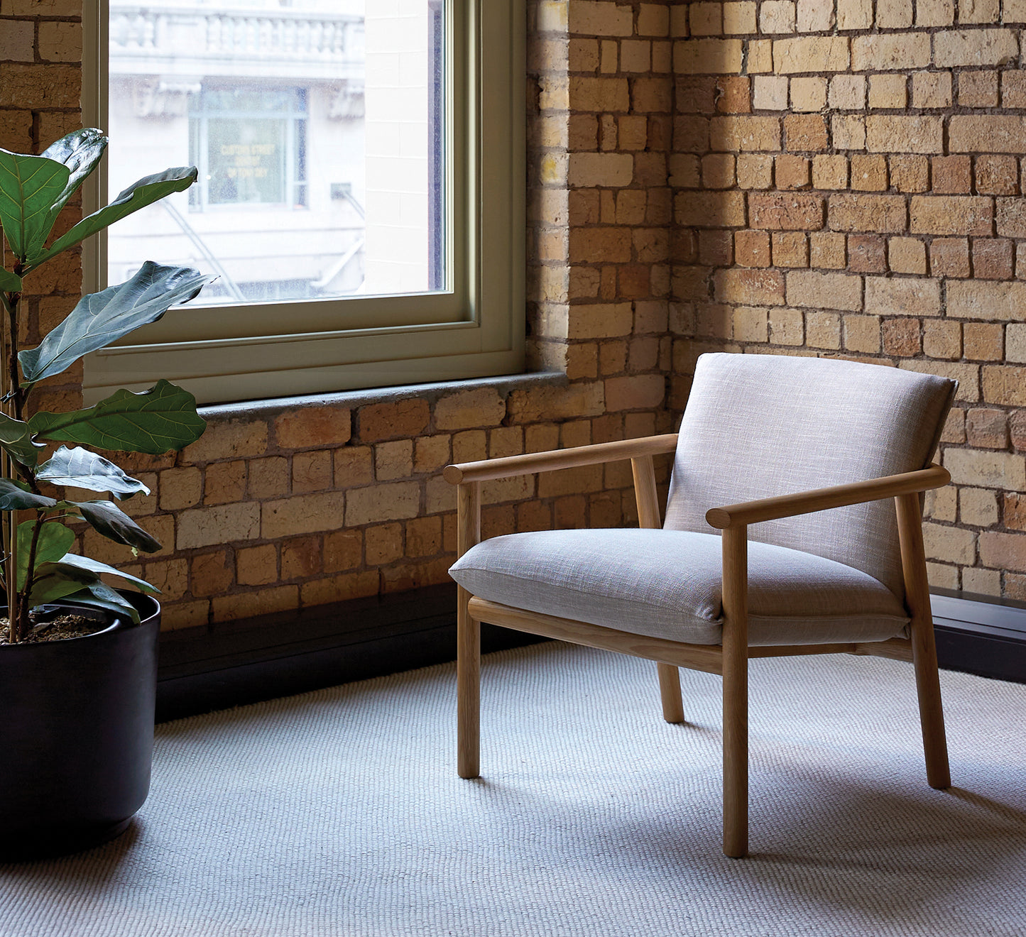 Label upholstered armchair beige