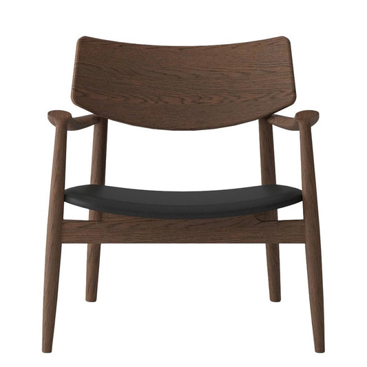 Solid oak lounge chair walnut with black leather seat