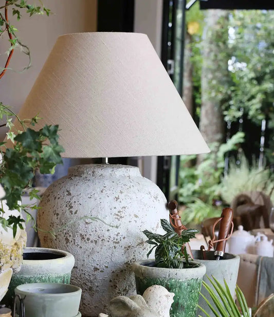 Rustic terracotta lamp with raw linen shade