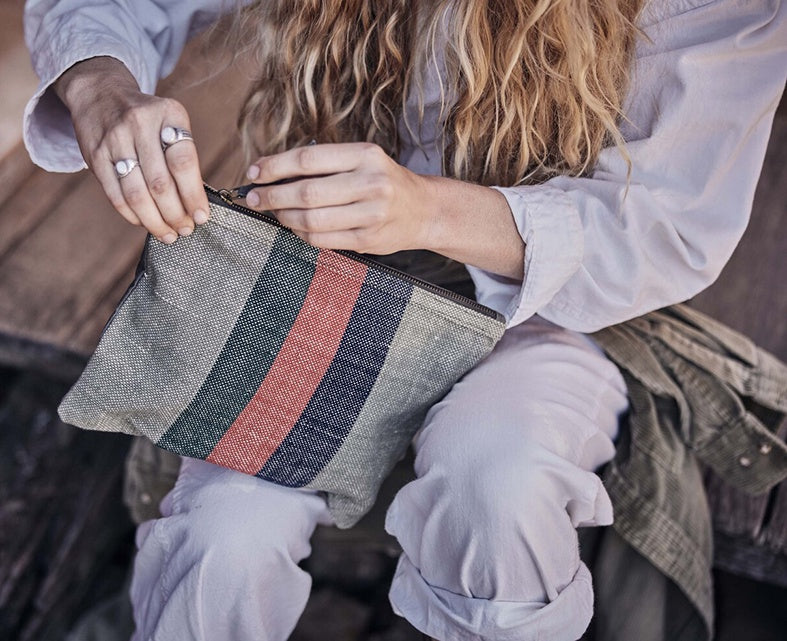 Pony Rider striped woven canvas clutch