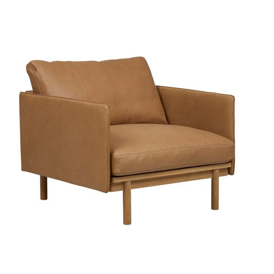Pensive camel leather armchair with oak frame
