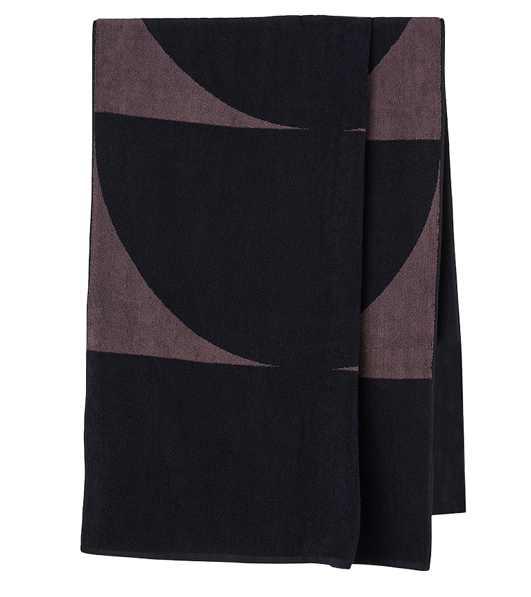 The generously sized balance beach towel is a summer essential for days spent lazing by the water's edge.   The towel is 100% cotton and the design features a bold geometric pattern in grape and navy blue colours. It has a 550gsm thickness.  Dimensions:  90cm wide x 170cm long