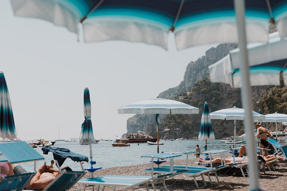 ‘Vacanze Estive II’ was taken by local NZ photographer Brijana Cato. Brijana took the photo in Positano on the Amalfi Coast, while on her recent travels around Italy. Brijana grew up in a small beach town north of Auckland, and she is hugely inspired by the ocean, coastline and anywhere warm and tropical. She is known for her fashion work with NZ fashion brands, often traveling around NZ and abroad.