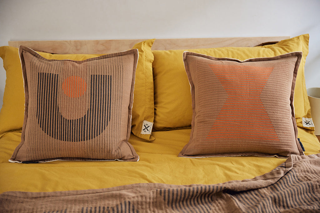 Loop road cushion cover 55cm tanzine