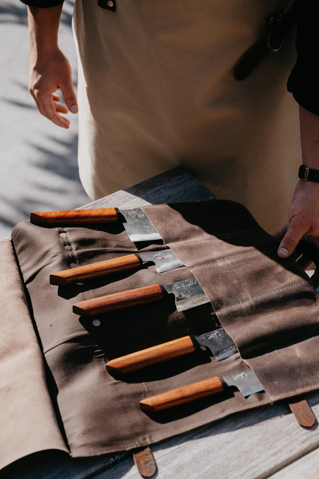 Leather six knife roll chocolate brown