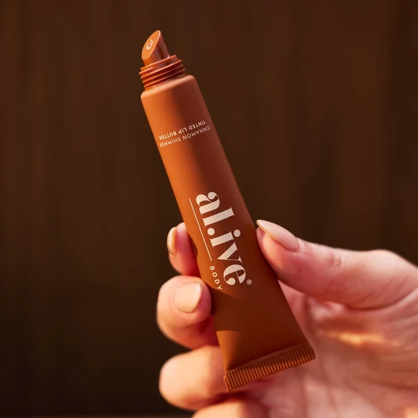 Al.ive tinted lip butter ornament cinnamon & citrus