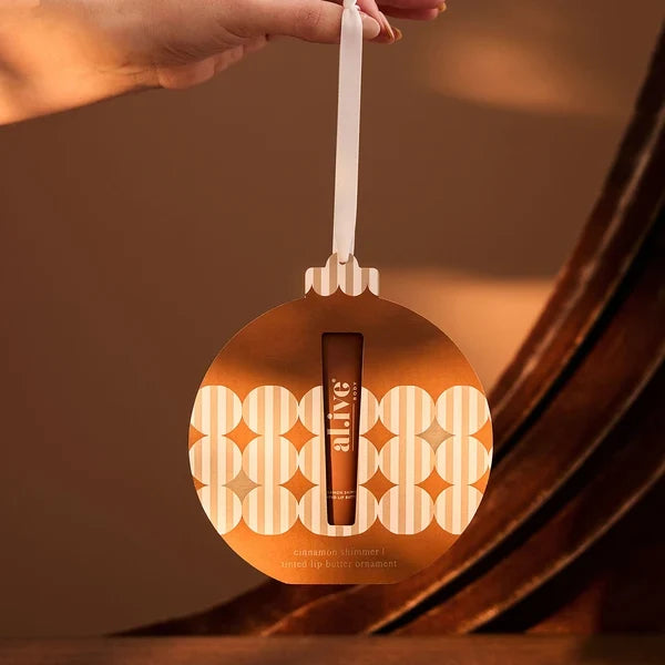 Al.ive tinted lip butter ornament cinnamon & citrus
