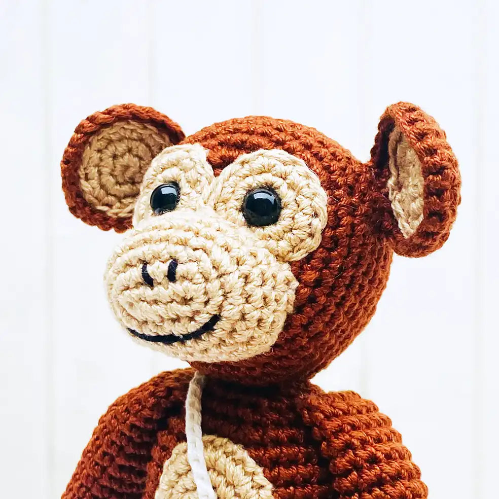 Fairtrade knit monkey toy with banana