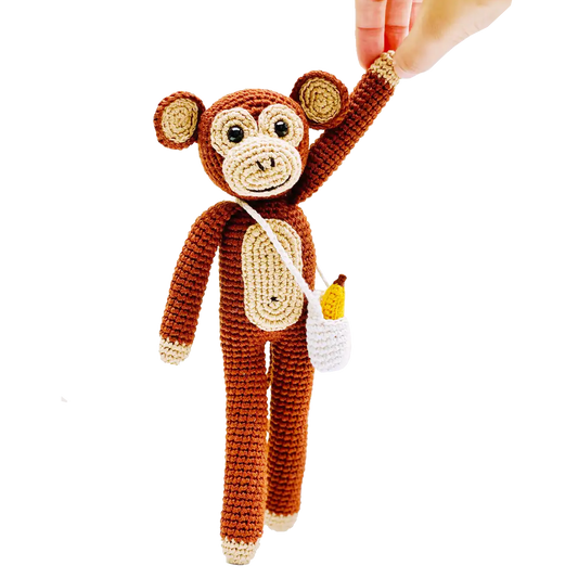 Fairtrade knit monkey toy with banana