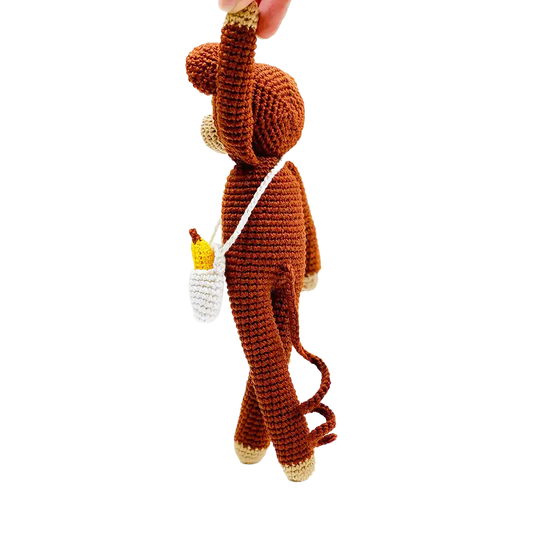 Fairtrade knit monkey toy with banana
