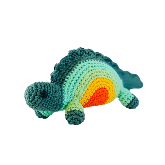 Fairtrade knit rainbow stegosaurus toy