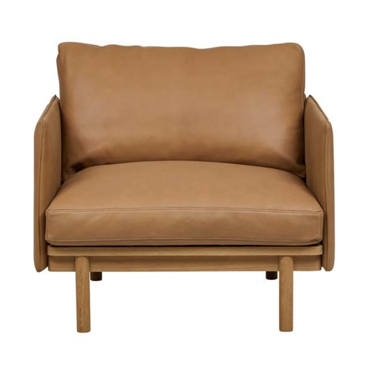 Pensive camel leather armchair with oak frame