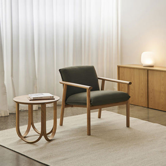 Label upholstered armchair olive
