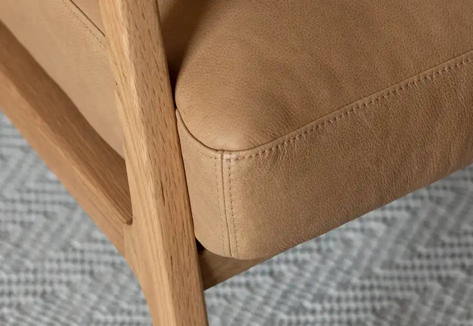 Nysse solid oak and leather armchair pecan