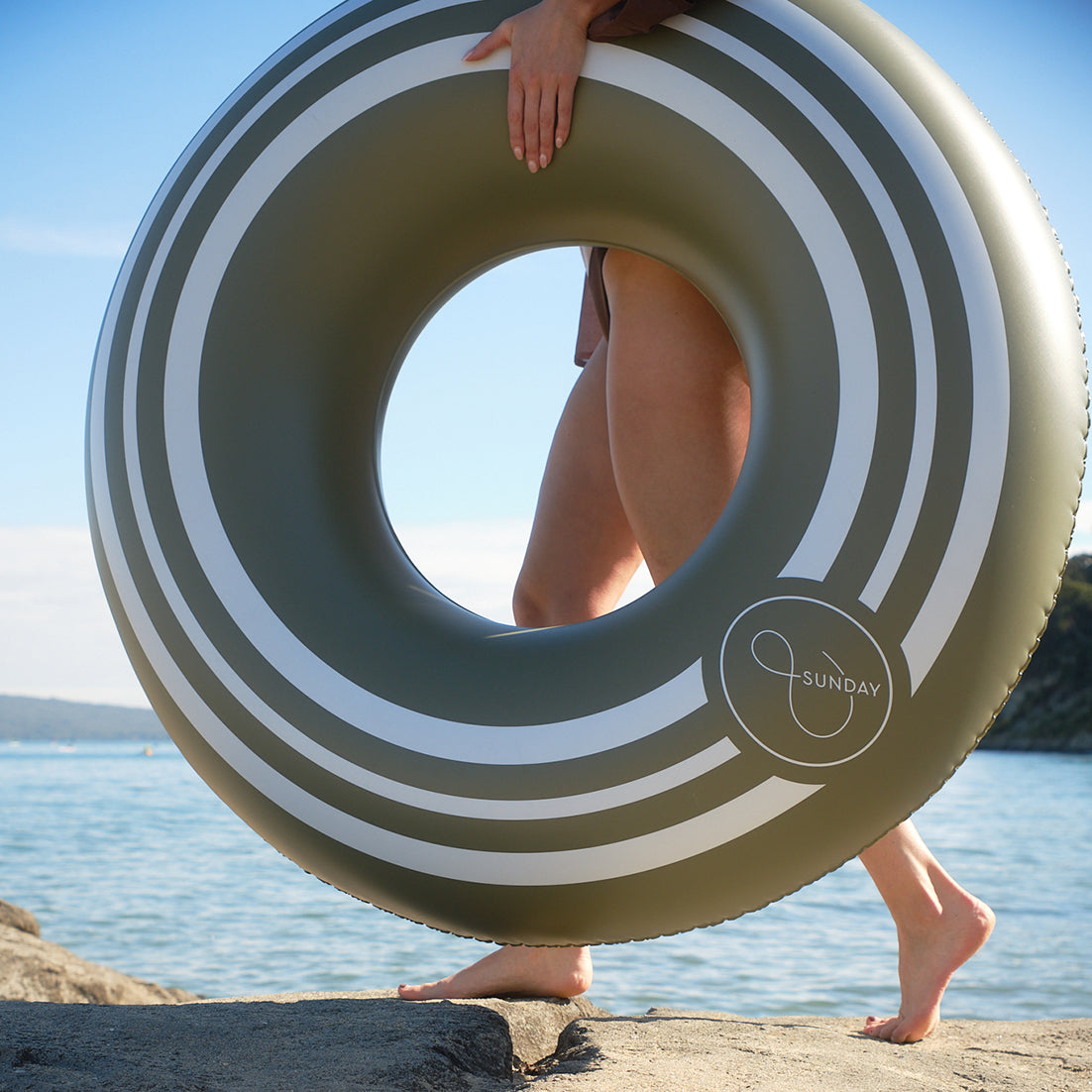 Oversized striped pool float olive 130cm