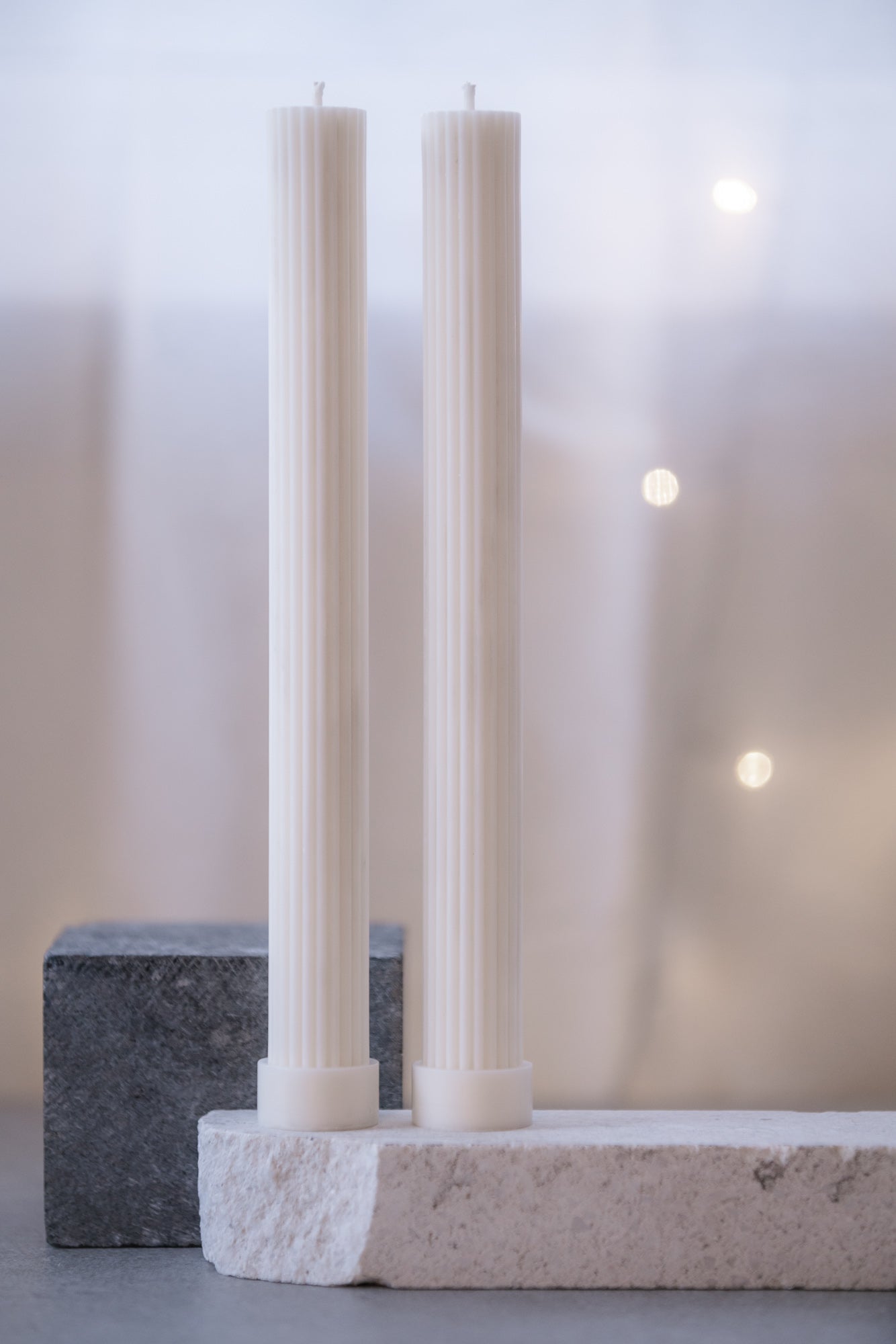 Ridged column candle with base off-white