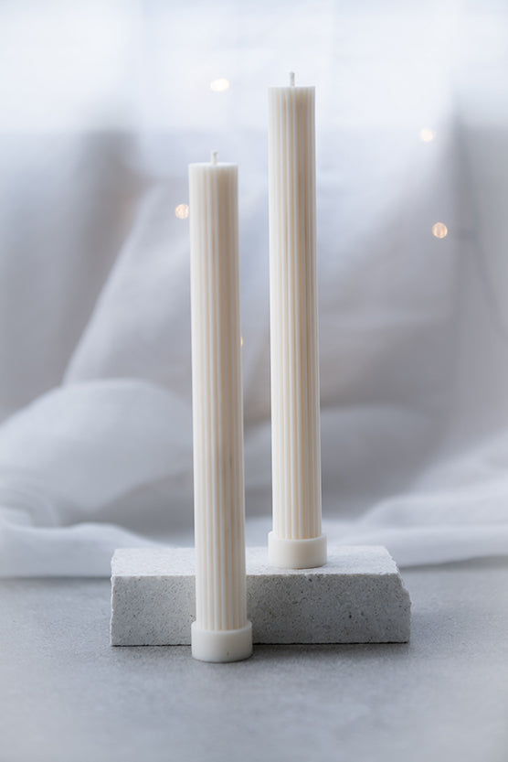 Ridged column candle with base off-white