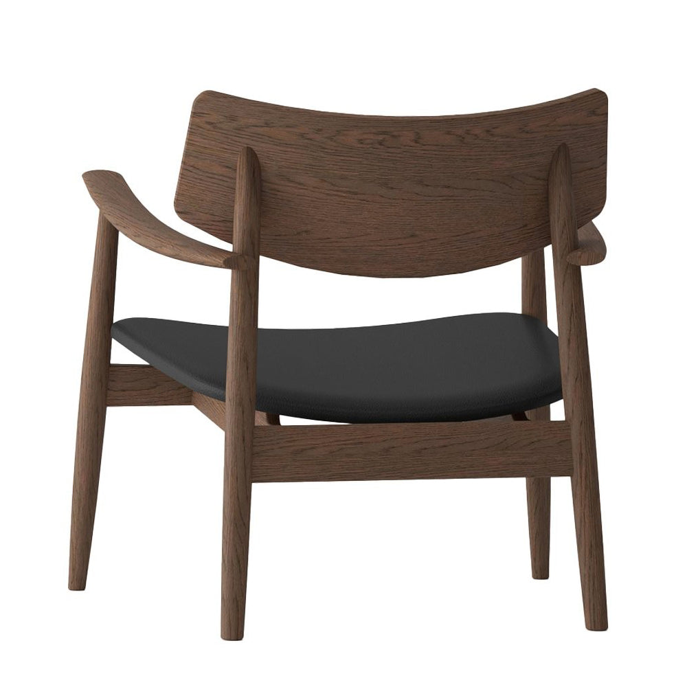 Solid oak lounge chair walnut with black leather seat