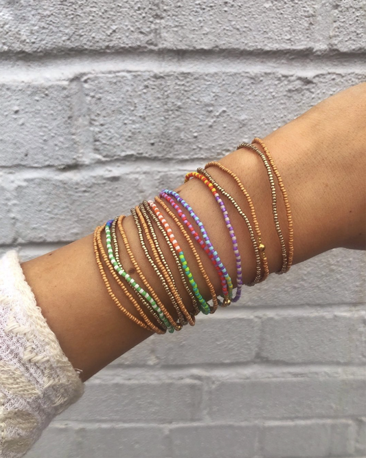 Set of 3 beaded bracelets green, gold & bronze
