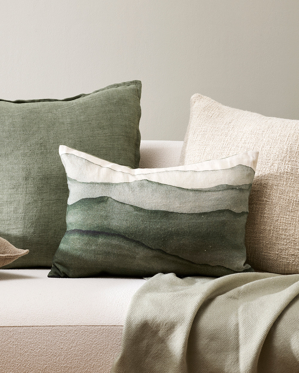 Sage green shop throws and cushions