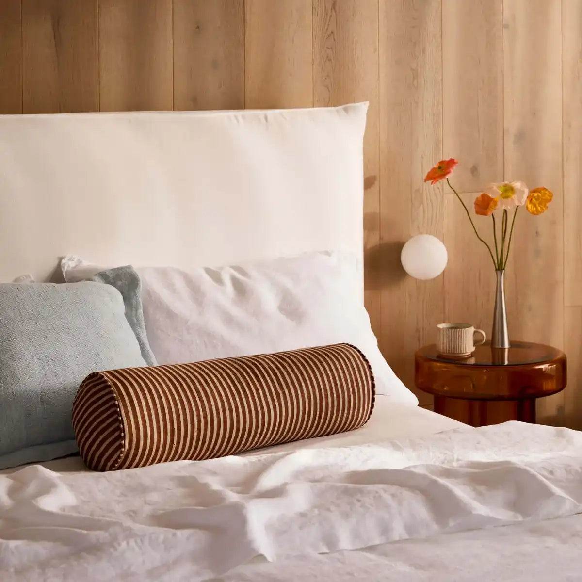 Margot linen striped bolster cushion 60cm clay