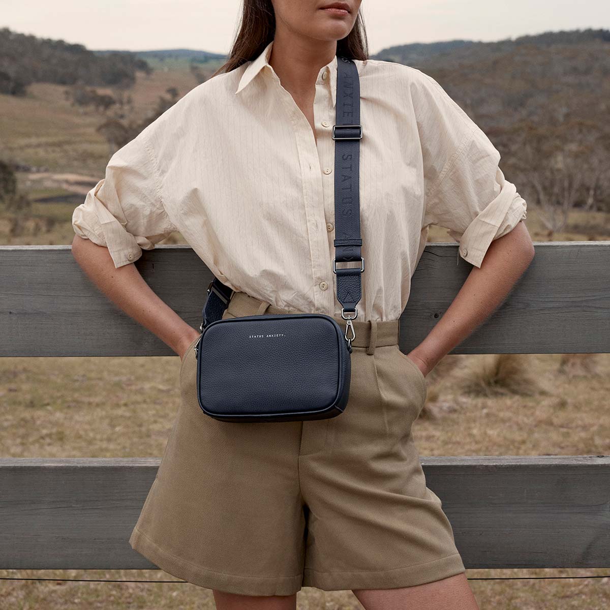Status Anxiety plunder leather bag with dual straps blue