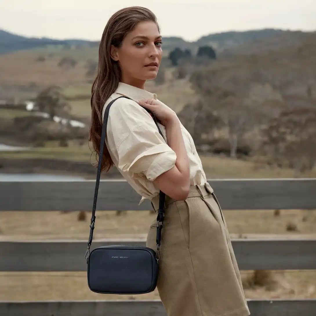 Status Anxiety plunder leather bag with dual straps blue