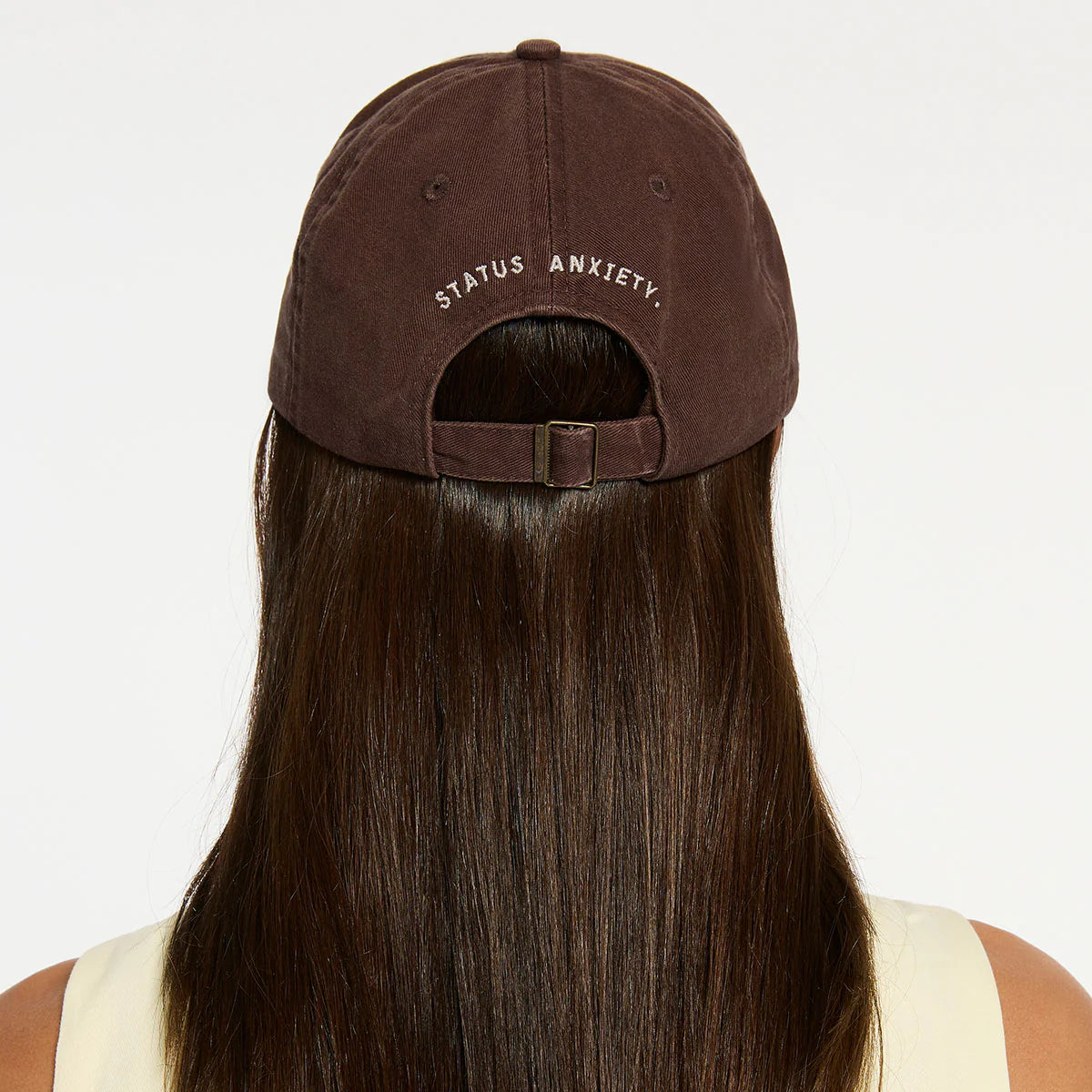 Status Anxiety under the sun cap bark