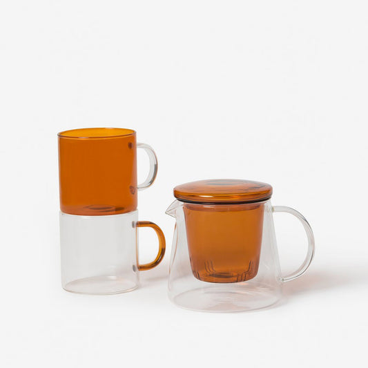 Clear glass teapot with amber lid