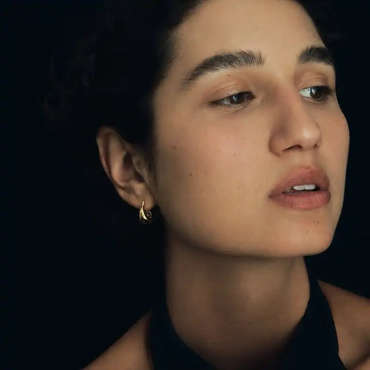 Temple of the Sun Poppy earrings gold