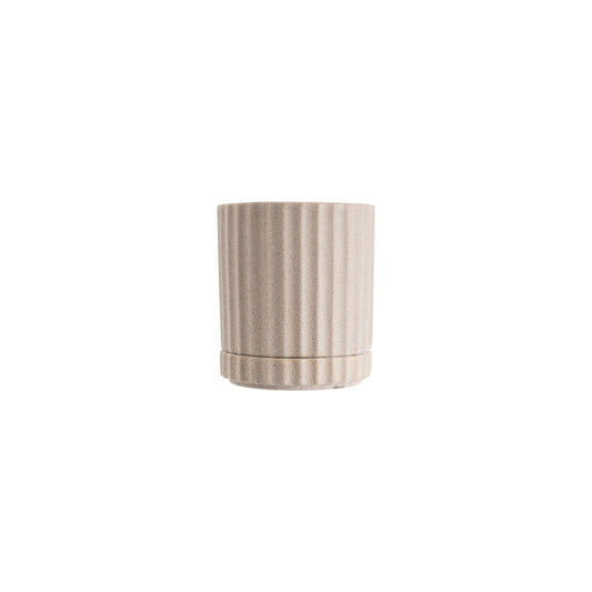 Inspired by the pillars at the Acropolis, the Athens planter in sand combines classic style with the functionality of a drainage hole and matching saucer.   The planter has a textured sand finish. Mix and match plant pots to add personality and greenery to any space.  Colour: rose sand  Dimensions: 10cm internal diameter x 13.5cm high