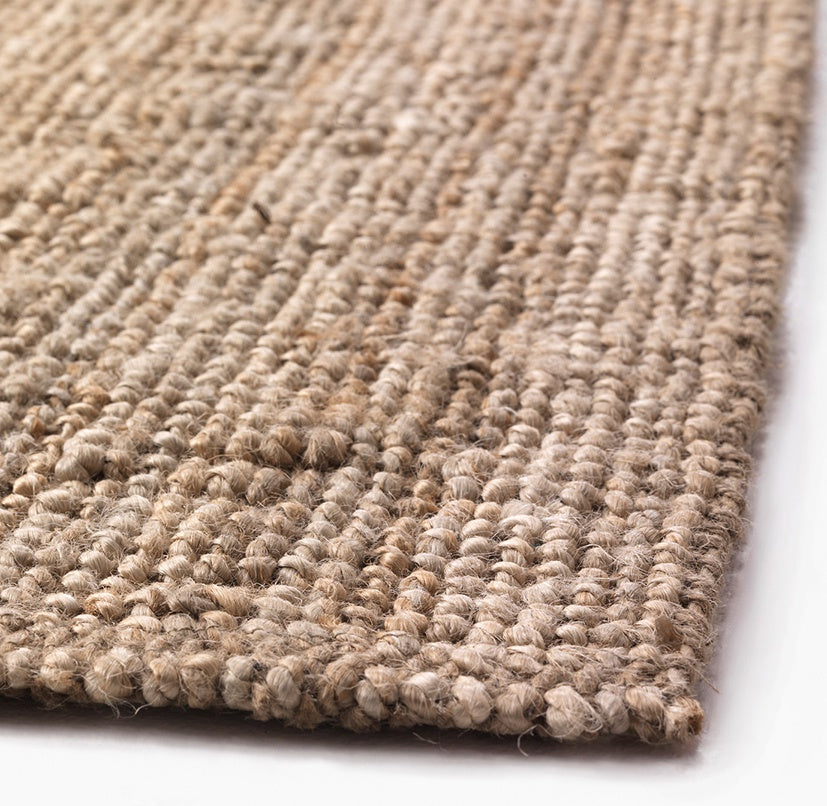 Our jute rugs and runners add a layer of textural detail to your home. Hand loomed in a chunky bouclé loop weave, it’s substantial and eco-friendly.  Due to the natural fibre used to create our rugs, slight variations in colour should be expected. Made in India.   Colour: natural  Sizes available (on request): 60 x 90cm 90 x 150cm 170 x 240cm 200 x 300cm 250 x 350cm 80 x 300cm 