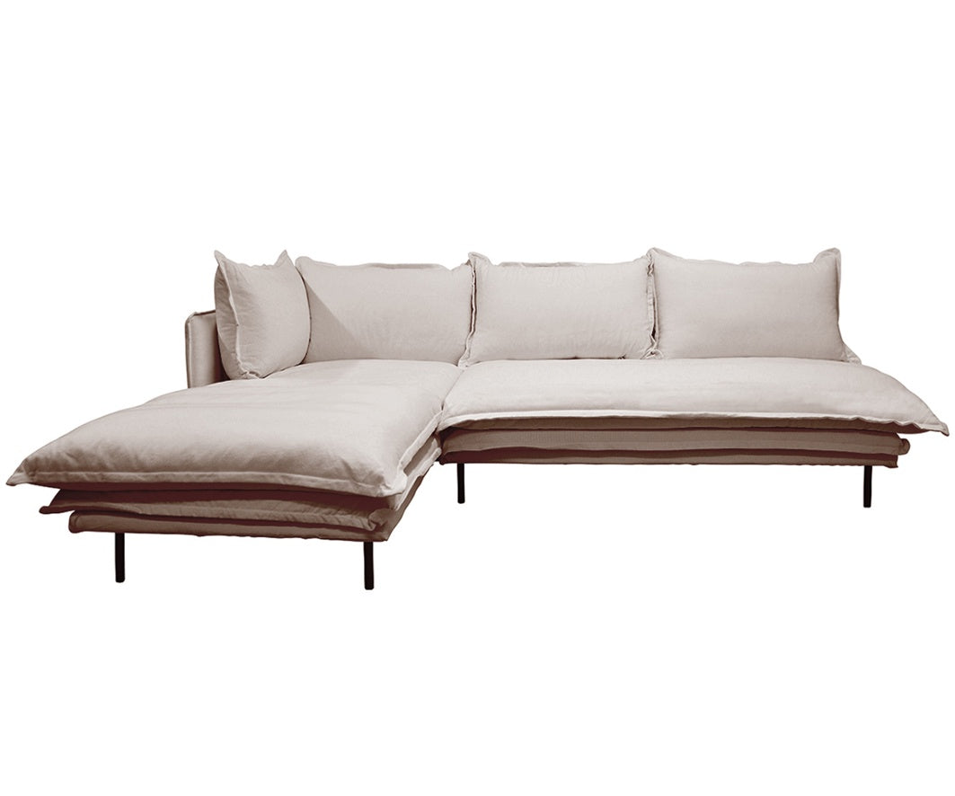 Gorgeous modular linen sofa with a relaxed, Japanese vibe. This setting has the option of having a left or right side return.  Two leg options are supplied with the sofa, sleek black metal legs and solid oak natural timber legs.  The covers are made of 100% linen, and the squabs are reversible. Dimensions: 260cm long x 180cm wide x 89cm high x 90cm deep  Colour: natural