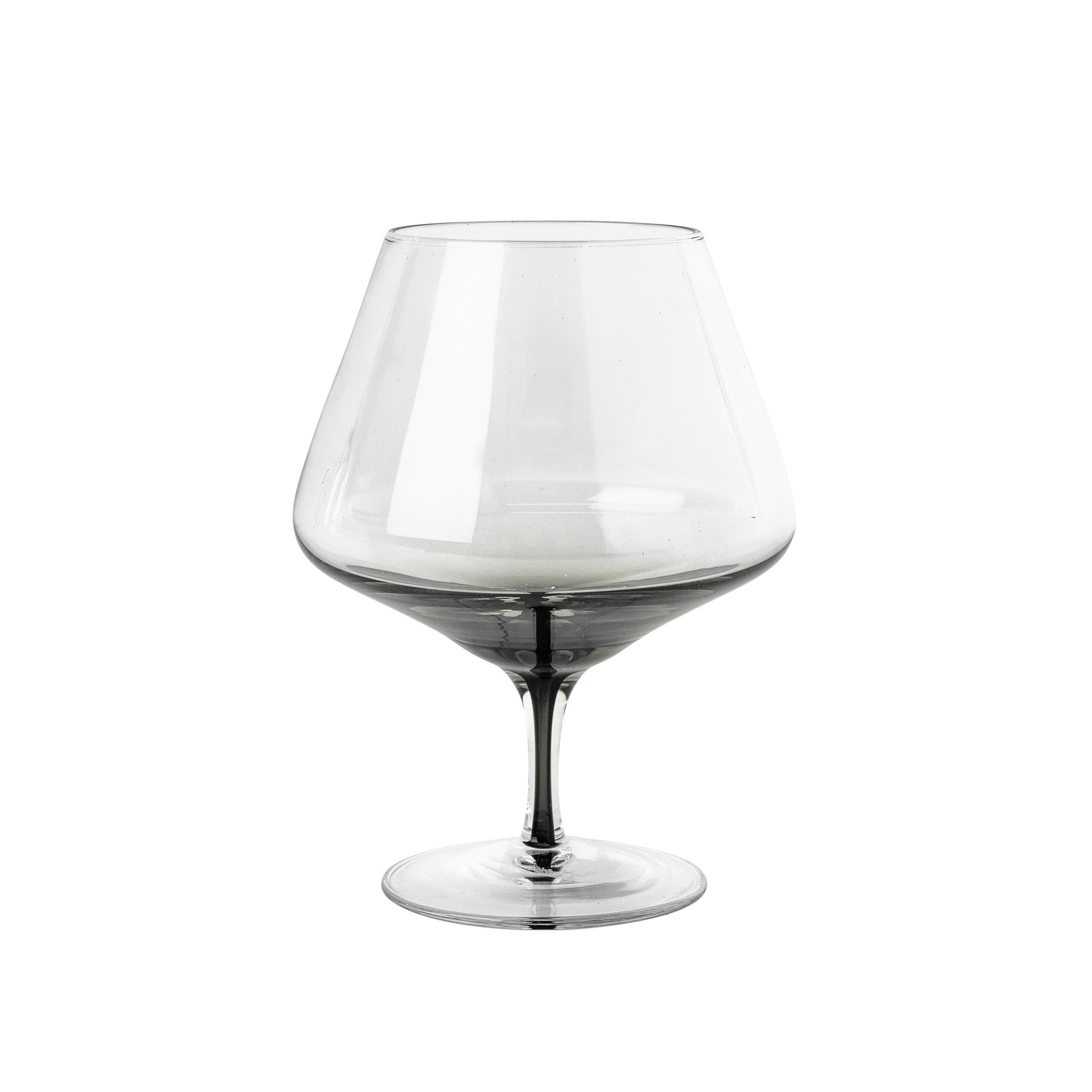 Serve cognac in the beautiful smokey grey glass from the Danish brand, Broste Copenhagen.  These hand blown wine glasses have a smokey grey bottom which carries down through the centre of the stem, to give them an edge over plain glassware. They would look stunning on any table.  Dimensions: 11cm diameter x 15cm high