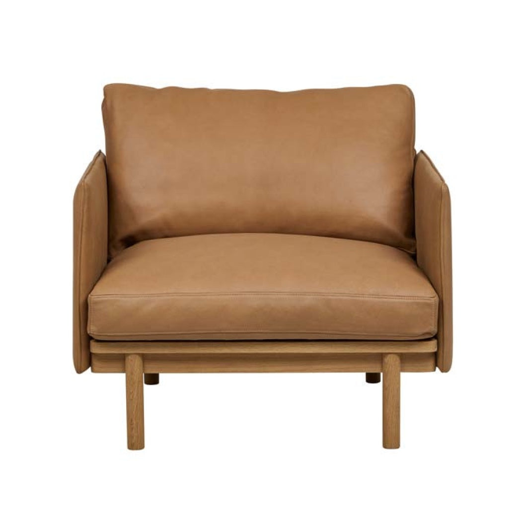 Pensive camel leather armchair with oak frame