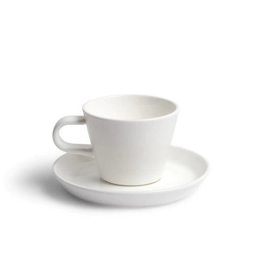 A modern Acme saucer made from durable porcelain and glazed in stunning kawakawa green.  Pairs perfectly with the 100mls Acme expresso cup.  Dimensions: 12cm diameter   Colour: white  Dishwasher safe.