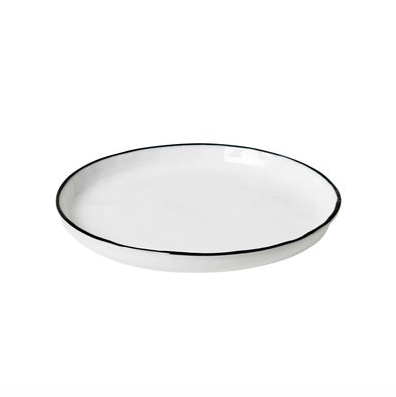 Elegant shaped plate from the Broste Copenhagen Salt dinnerware collection.   The dessert plate features a black hand painted brim making each piece unique.  Commercially rated dinnerware range made of porcelain.  Dimensions: 17.6cm diameter x 1.5cm high