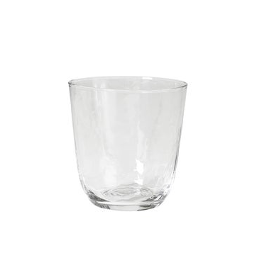 Beautiful hammered clear glass tumbler by Broste Copenhagen that is the definition of perfect imperfection.  Every piece is handmade and completely unique, and will vary in colour, size and thickness. The collection is focused around accentuating the artisan feel, expressed through the hammered surface of the products. These items have a certain mysterious way of reflecting the light, granting them a compelling allure.  Dimensions: 9cm wide x 9.5cm high, 6cm wide at base