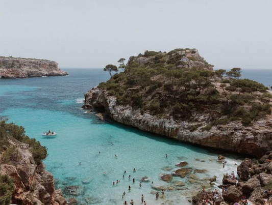‘Mallorca Cove’ was taken by NZ photographer Brijana Cato. Brijana took the landscape photograph on a day trip to a gorgeous swim spot in Mallorca, Spain.   Brijana grew up in a small beach town north of Auckland, and she is hugely inspired by the ocean, coastline and anywhere warm and tropical. She is known for her fashion work with NZ fashion brands, often traveling around NZ and abroad.