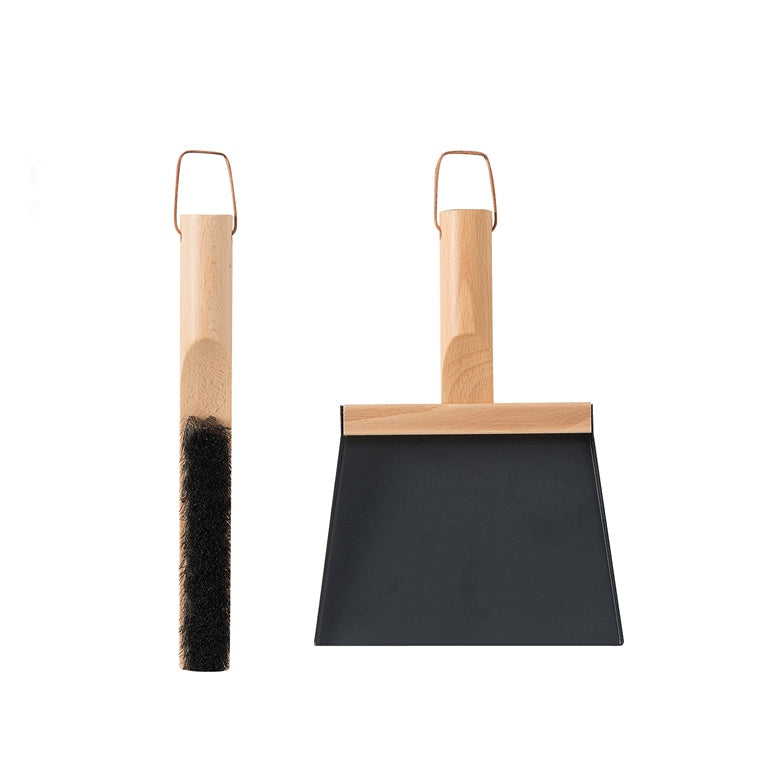 This stylish Andree Jardin brush and shovel set is a must-have kitchen accessory. Designed and made in France using high quality materials.  The set is made of natural beech wood and the shovel is made of black powdercoated metal.  Dimensions: Brush 30cm long x 9cm wide, shovel 30cm long x 20cm wide 