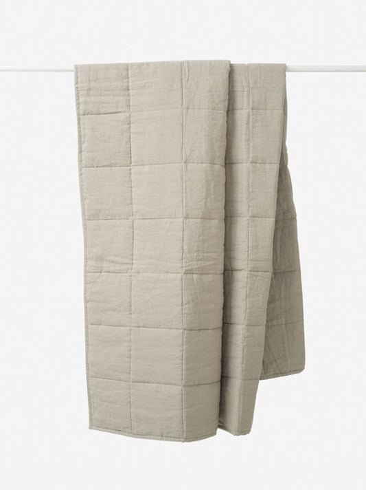 Linen quilted blanket puddle