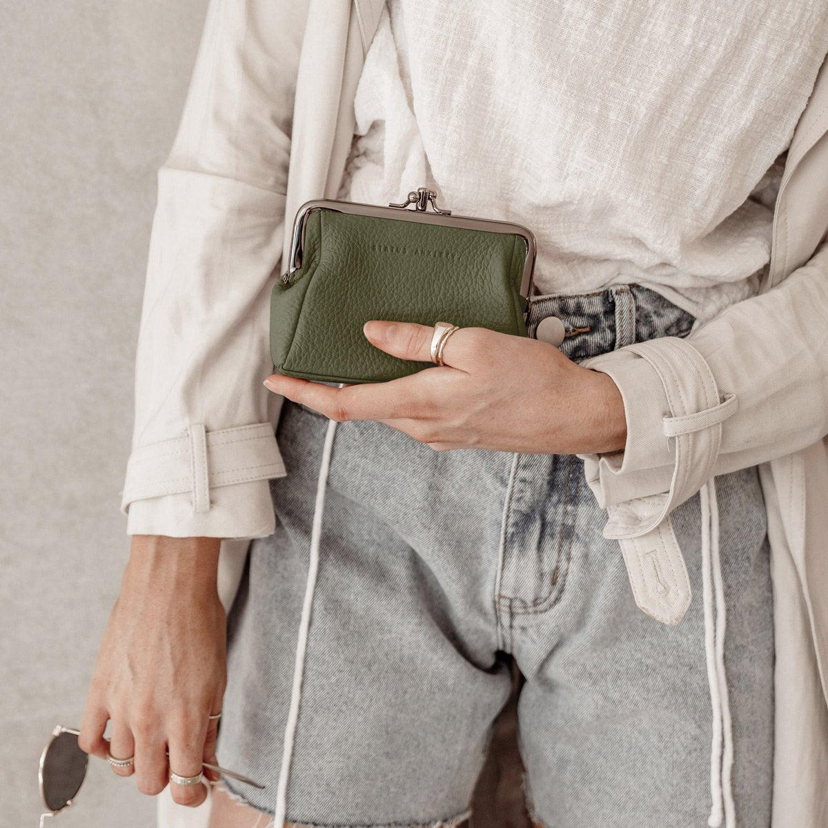 Status Anxiety leather clasp purse khaki